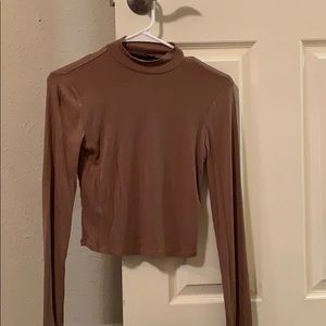 Cute brown lightly turtle necked shirt!